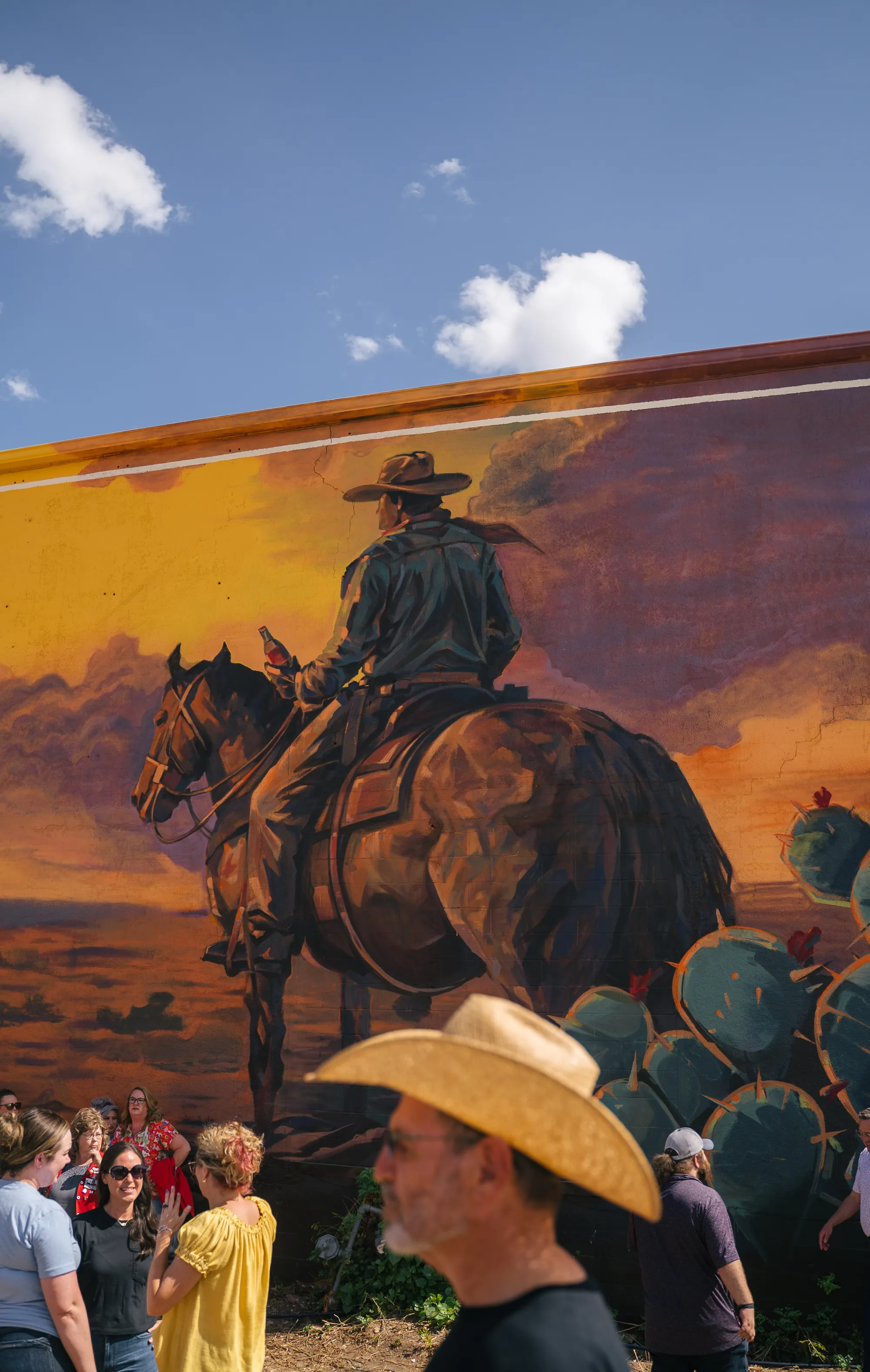 Close detail of the cowboy figure in the Frontier Spirit mural in Abilene, Texas