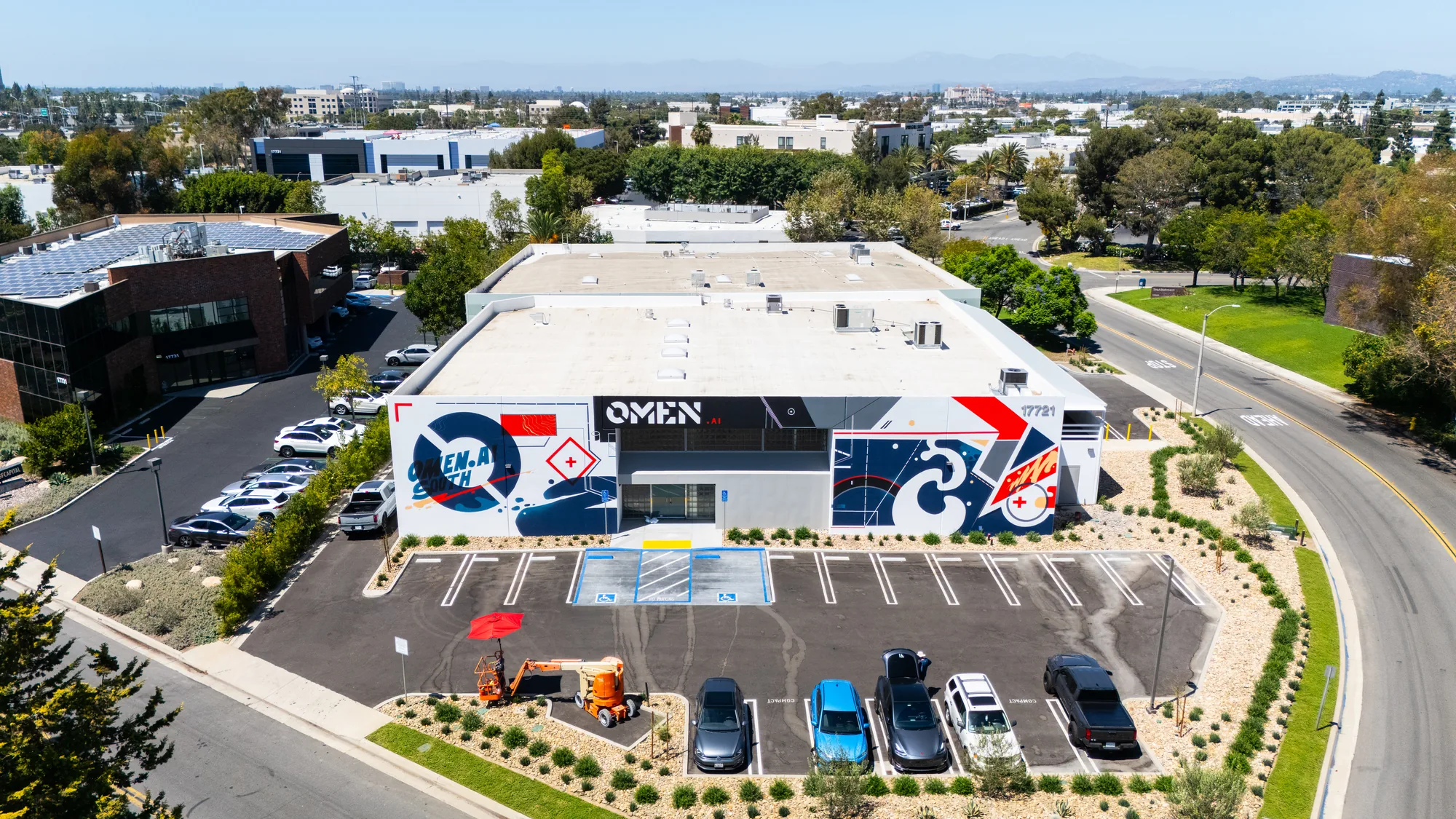 Aerial view of the Omen AI building mural in Orange County